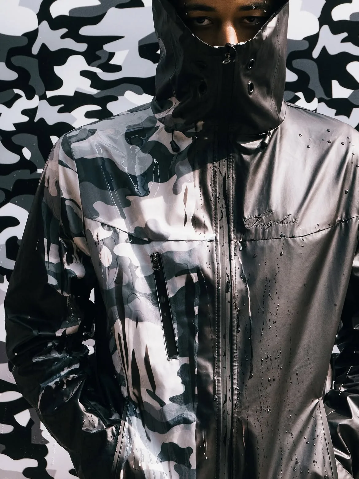Close-up of the windbreaker worn with the hood up
